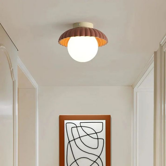 Ceiling Lamp with Milk Glass Shade Providing Warm Lighting in the Hall