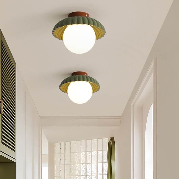 Ceiling Lamp with Milk Glass Shade Providing Warm Lighting in the Hall