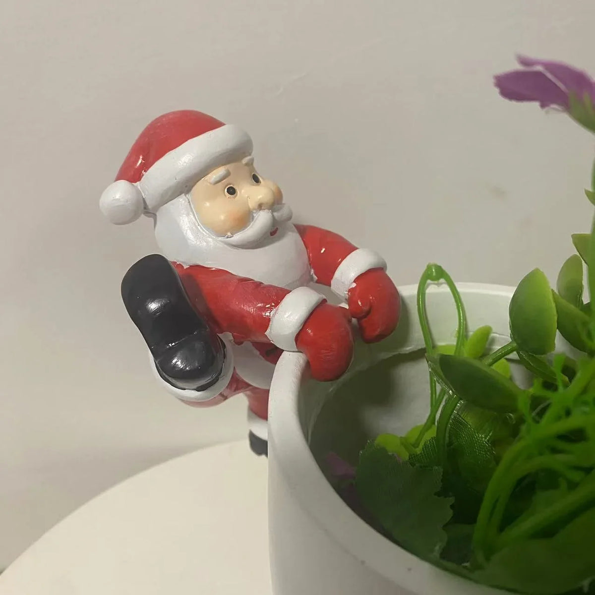 Dekorativ snemand som festlig plantepynt