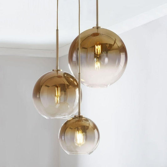 Nokmo | Glass Ball Pendant Light | Modern Brass Design
