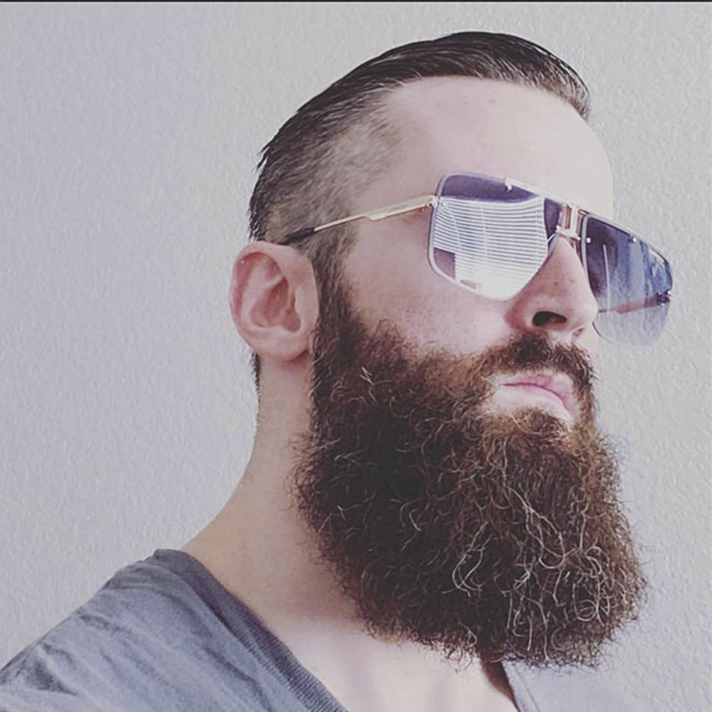 Oversize solbriller i aviator-stil med firkantede, tonede glas uden stel og dobbeltbro