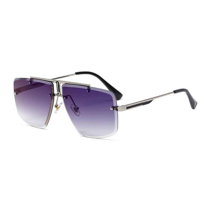 Oversize solbriller i aviator-stil med firkantede, tonede glas uden stel og dobbeltbro