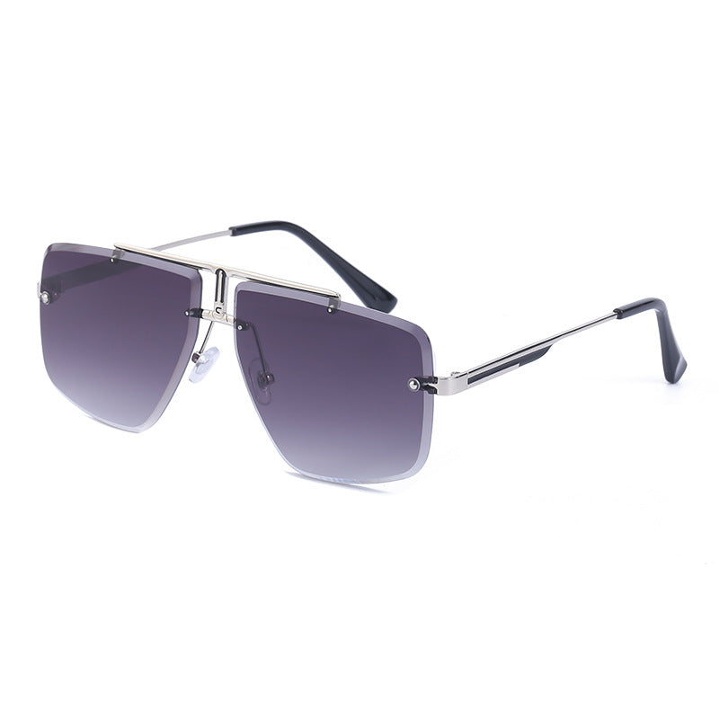 Oversize solbriller i aviator-stil med firkantede, tonede glas uden stel og dobbeltbro