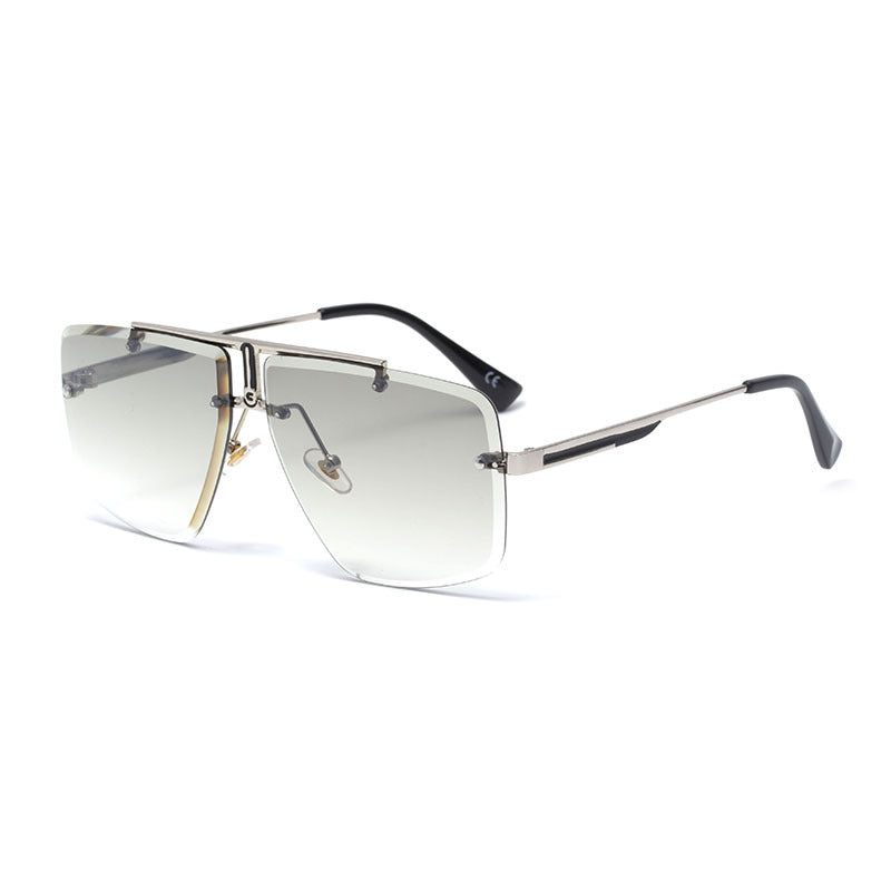 Oversize solbriller i aviator-stil med firkantede, tonede glas uden stel og dobbeltbro