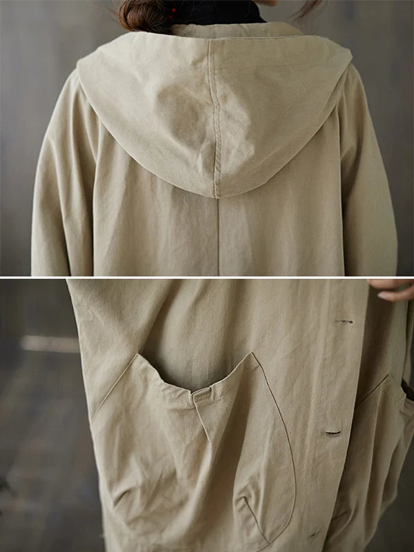 Lang trenchcoat til kvinder med hætte - elegant regnjakke med flot snit