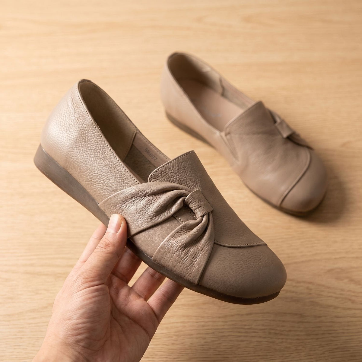 Ortopædiske slip-on-ballerinaer i læder til kvinder med sløjfedetalje