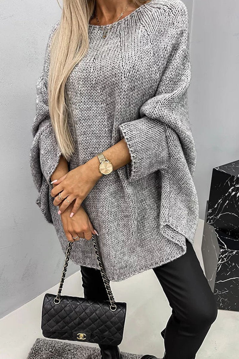 Dámský oversized pletený svetr s netopýřími rukávy a kulatým výstřihem