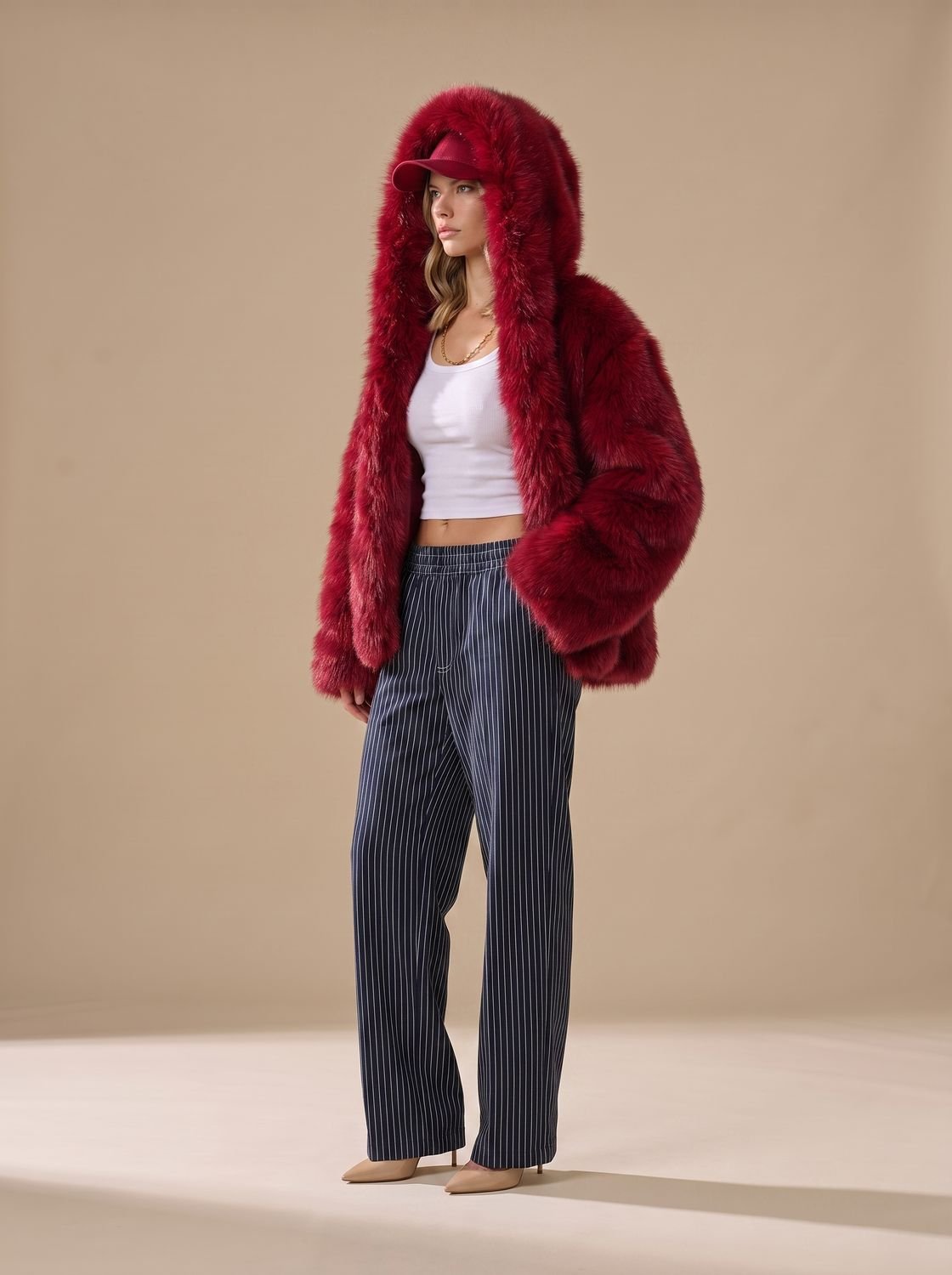 Γυναικείο oversized μακρύ χειμερινό παλτό με κουκούλα, από συνθετική γούνα και μακριά μανίκια